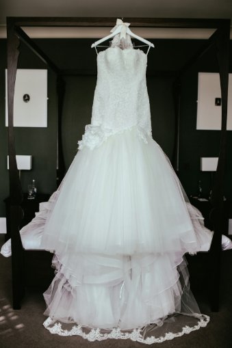 Wedding gown hanging, ready for a bride to be gifted through Everlasting Closet